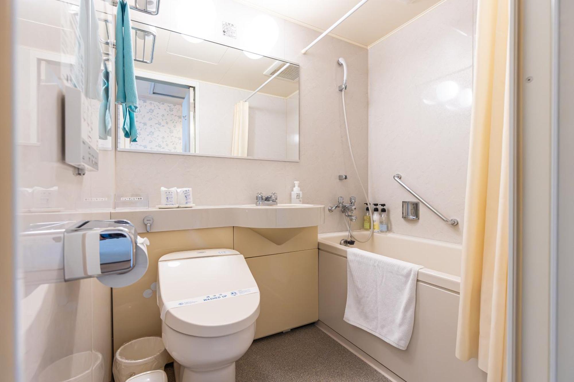 New Sunpia Tsuruga Hotell Exteriör bild