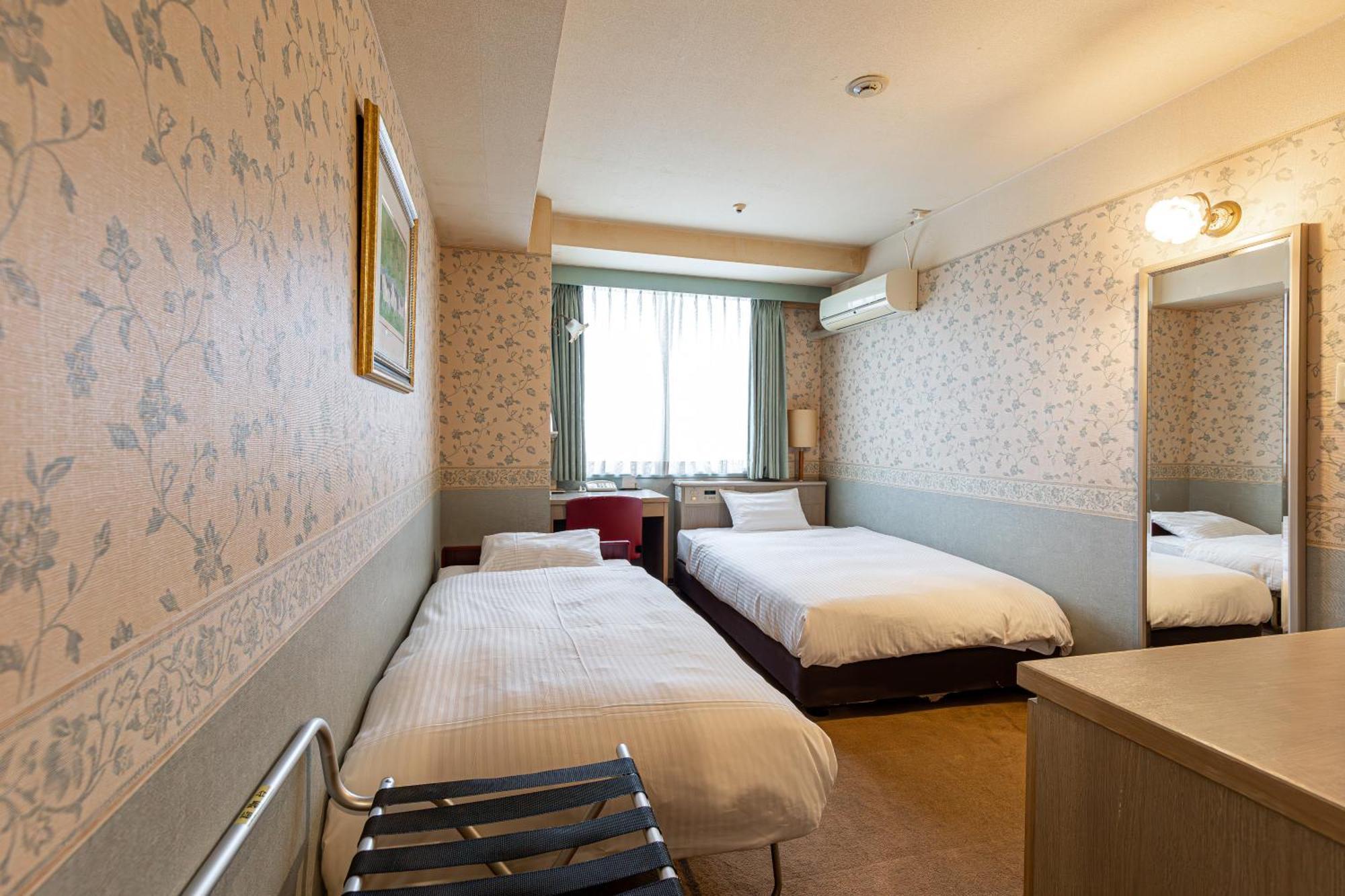 New Sunpia Tsuruga Hotell Exteriör bild