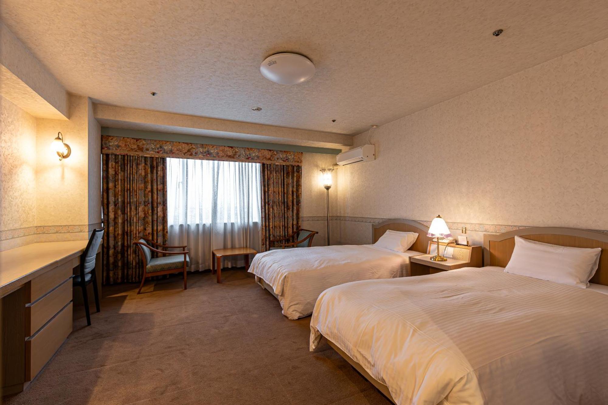 New Sunpia Tsuruga Hotell Exteriör bild